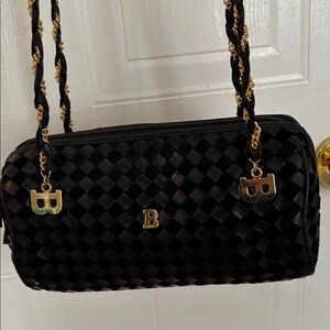 BALLY. Black and Gold Braided Handbag